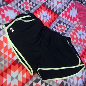 black and neon green under armour athletic shorts